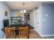 Dining area with view of the laundry room and hall closet in the background at 21 Rivers Point Row Row # 17 B, Charleston, SC 29412