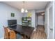 Open dining area adjacent to kitchen with modern lighting and neutral decor at 21 Rivers Point Row Row # 17 B, Charleston, SC 29412