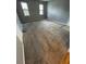 Spacious living room features carpet flooring, two windows, and neutral paint, offering a bright space at 21 Rivers Point Row Row # 17 B, Charleston, SC 29412