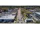 Aerial view of a bustling downtown area with a town square and a variety of shops and restaurants at 214 E Doty Ave, Summerville, SC 29483