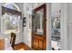 A beautiful wooden door with glass panes leads to a welcoming porch at 214 E Doty Ave, Summerville, SC 29483