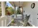 Relaxing front porch with rocking chairs, a porch swing, and a ceiling fan at 214 E Doty Ave, Summerville, SC 29483