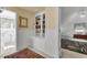 Hallway leading to bathroom and bedroom with built-in bookcase at 214 E Doty Ave, Summerville, SC 29483