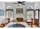 Well-lit kitchen and dining area with large windows, a fireplace, and an open layout at 214 E Doty Ave, Summerville, SC 29483