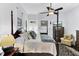 Bedroom features a four poster bed, hardwood floors, and lots of natural light at 214 E Doty Ave, Summerville, SC 29483