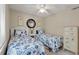 Inviting bedroom with twin beds featuring seashell bedding and matching decorative dresser at 214 Sea Cloud Cir, Edisto Island, SC 29438