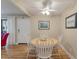 Charming dining area featuring hardwood floors, a round table with four chairs, and a ceiling fan at 214 Sea Cloud Cir, Edisto Island, SC 29438
