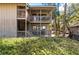 Exterior view of a condo featuring multiple balconies with beautiful outdoor scenery at 214 Sea Cloud Cir, Edisto Island, SC 29438