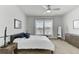 Comfortable bedroom with carpet, ceiling fan, natural light, and stylish decor at 220 Garden Gate Way, Summerville, SC 29486