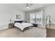 Serene bedroom with a ceiling fan, window with blinds, and cozy furnishings at 220 Garden Gate Way, Summerville, SC 29486