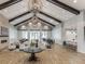 Spacious clubhouse with elegant lighting, comfortable seating, and cozy fireplace at 220 Garden Gate Way, Summerville, SC 29486