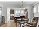 Dining area next to kitchen with an attractive modern lighting fixture and comfortable chair at 220 Garden Gate Way, Summerville, SC 29486