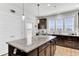 Kitchen with large island, granite countertops and stainless appliances at 220 Garden Gate Way, Summerville, SC 29486