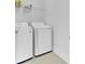 Laundry room with white washer and dryer at 220 Garden Gate Way, Summerville, SC 29486