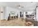 Open concept living room with hardwood floors, a ceiling fan, and comfortable seating arrangement at 220 Garden Gate Way, Summerville, SC 29486