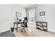 Home office with a desk, chair, window, and bookshelf at 220 Garden Gate Way, Summerville, SC 29486
