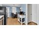 Dining room features a wood dining table with black chairs and natural lighting at 2236 Pinehurst Ave, Charleston, SC 29414