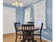 Cozy dining room area featuring a chandelier, wood floors, and natural lighting at 2236 Pinehurst Ave, Charleston, SC 29414