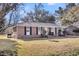Charming single-story brick home with a well-manicured front lawn at 2236 Pinehurst Ave, Charleston, SC 29414
