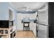 Modern kitchen with stainless steel appliances, white cabinetry and wood floors at 2236 Pinehurst Ave, Charleston, SC 29414