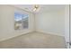 Bedroom featuring a large window offering ample natural light and neutral carpeting at 2244 Ashley Crossing Dr # 1236, Charleston, SC 29414