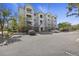 Charming multi-story condo building with well-maintained landscaping and ample parking space at 2244 Ashley Crossing Dr # 1236, Charleston, SC 29414