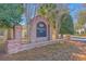 Attractive brick sign for Persimmon Hill community, surrounded by mature landscaping at 234 Darcy Ave, Goose Creek, SC 29445