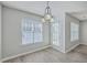 Dining room showcasing windows, light gray walls, and wood floor at 234 Darcy Ave, Goose Creek, SC 29445