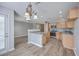 Bright kitchen features stainless appliances, granite countertops, and wood flooring at 234 Darcy Ave, Goose Creek, SC 29445