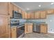 Kitchen featuring stainless steel appliances, granite countertops, and wood flooring at 234 Darcy Ave, Goose Creek, SC 29445