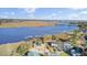 Beautiful aerial view of a waterfront property with a private dock with direct access to the river at 2399 Furman Dr, Charleston, SC 29414