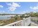 Scenic balcony view overlooking the marsh and dock, perfect for relaxing and enjoying the outdoors at 2399 Furman Dr, Charleston, SC 29414