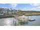 Beautiful waterfront home with a private dock, perfect for boating and enjoying the water at 2399 Furman Dr, Charleston, SC 29414