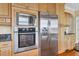 Kitchen with stainless steel appliances, including a built-in oven, microwave, and refrigerator at 2399 Furman Dr, Charleston, SC 29414
