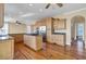 Spacious open kitchen design with wood floors and stainless steel appliances at 2399 Furman Dr, Charleston, SC 29414