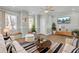 Living room with wood flooring, built-in bench seating and modern decor at 2399 Furman Dr, Charleston, SC 29414