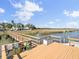 View from dock to the home which has an elevated dock and walkway across a marsh at 2399 Furman Dr, Charleston, SC 29414