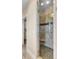 Custom shower with glass door and tile surround with a built-in seat for convenience at 2399 Furman Dr, Charleston, SC 29414