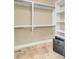 Organized walk-in closet with built-in shelving and rods for optimal storage solutions at 2399 Furman Dr, Charleston, SC 29414