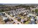 An aerial view shows a quiet residential neighborhood with tree-lined streets and well-kept homes in a quiet location at 2508 Melville Rd, North Charleston, SC 29406