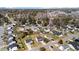 An aerial view showcases a suburban community with well-spaced homes, mature trees, and manicured lawns at 2508 Melville Rd, North Charleston, SC 29406