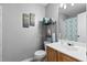 Bathroom with vanity, decorative art and shelving at 2508 Melville Rd, North Charleston, SC 29406