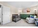 Bright Bedroom includes a crib and a rocking chair with views to the open door at 2508 Melville Rd, North Charleston, SC 29406