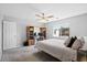 Bedroom with desk, chair, a ceiling fan, and a large window that lets in lots of natural light at 2508 Melville Rd, North Charleston, SC 29406