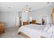 Bright bedroom with vaulted ceiling, ceiling fan, and neutral carpeting at 2508 Melville Rd, North Charleston, SC 29406