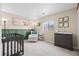 Cozy Bedroom with a crib, rocking chair, and coordinating decor at 2508 Melville Rd, North Charleston, SC 29406