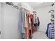 Walk-in closet with metal shelving and hanging rods filled with clothes at 2508 Melville Rd, North Charleston, SC 29406
