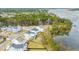 An aerial view shows the white homes in the community that back up to the marsh at 3554 Clambank Dr, Mount Pleasant, SC 29466