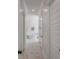 Bright bathroom featuring a modern freestanding bathtub and marble floors at 3554 Clambank Dr, Mount Pleasant, SC 29466