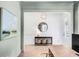 Charming entryway with stylish console table and decorative mirror, leading to the front door at 3554 Clambank Dr, Mount Pleasant, SC 29466
